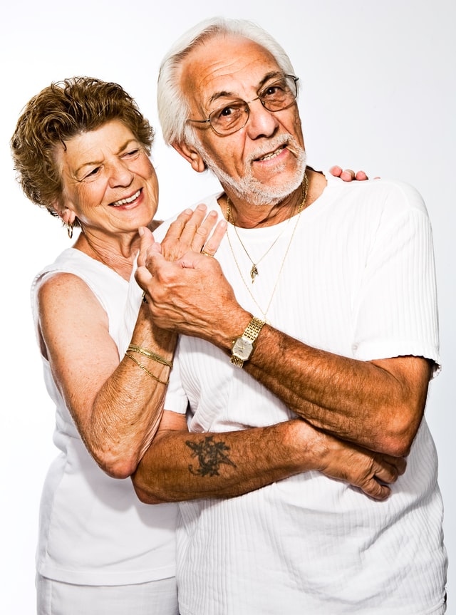 elderly couple smiling